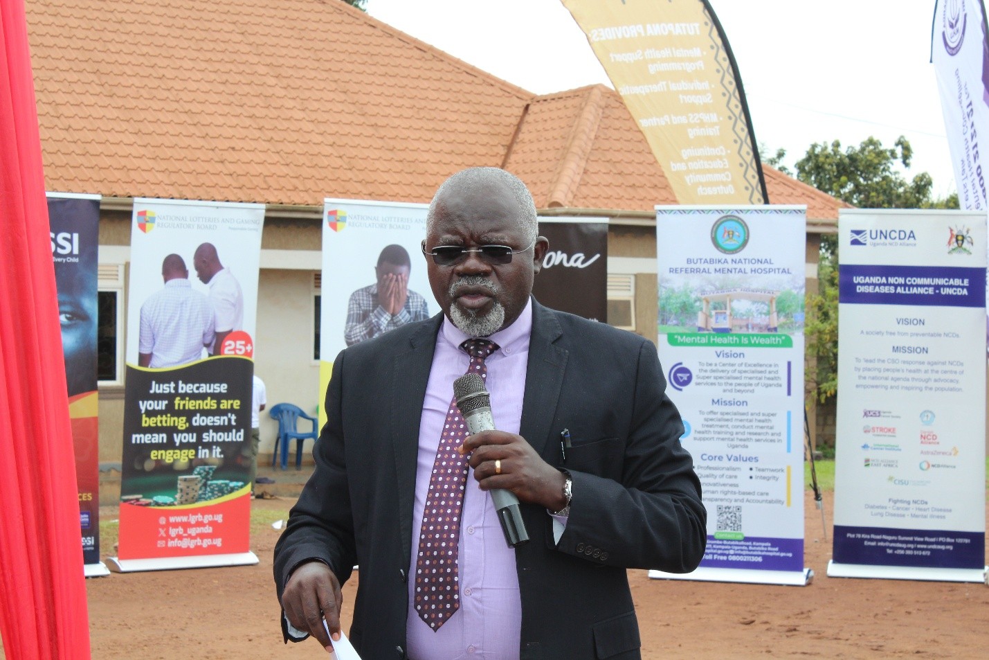 Dr. Driwale Alfred, Commissioner for Institutional Capacity Building and Human Resource Development at the Ministry of Health giving his remarks during the commemoration of world mental health day.